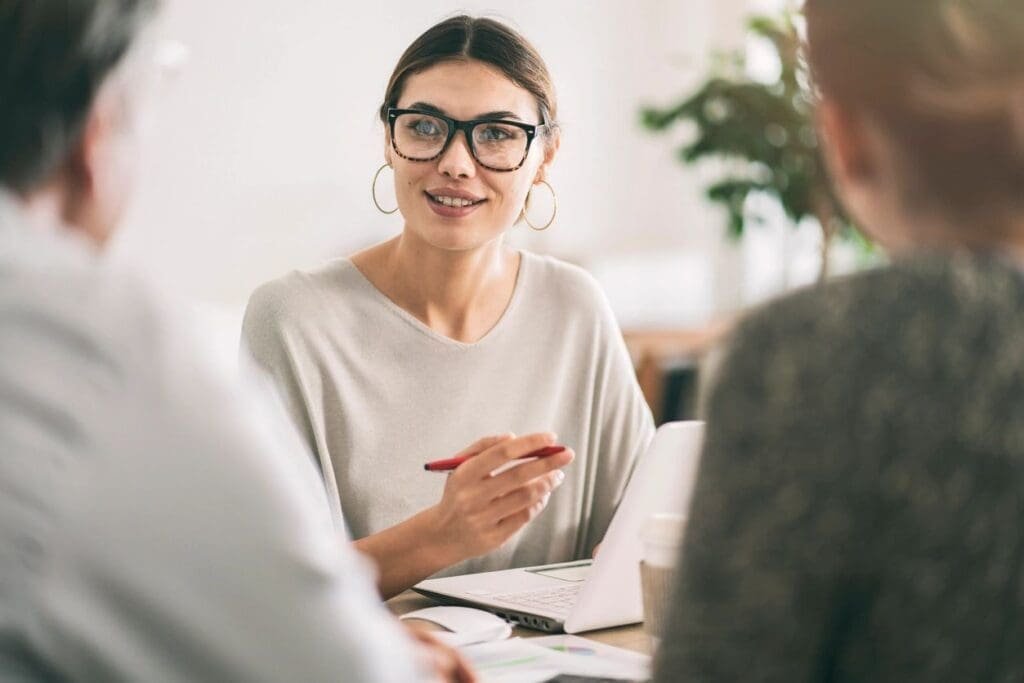 image of a lady talking to others